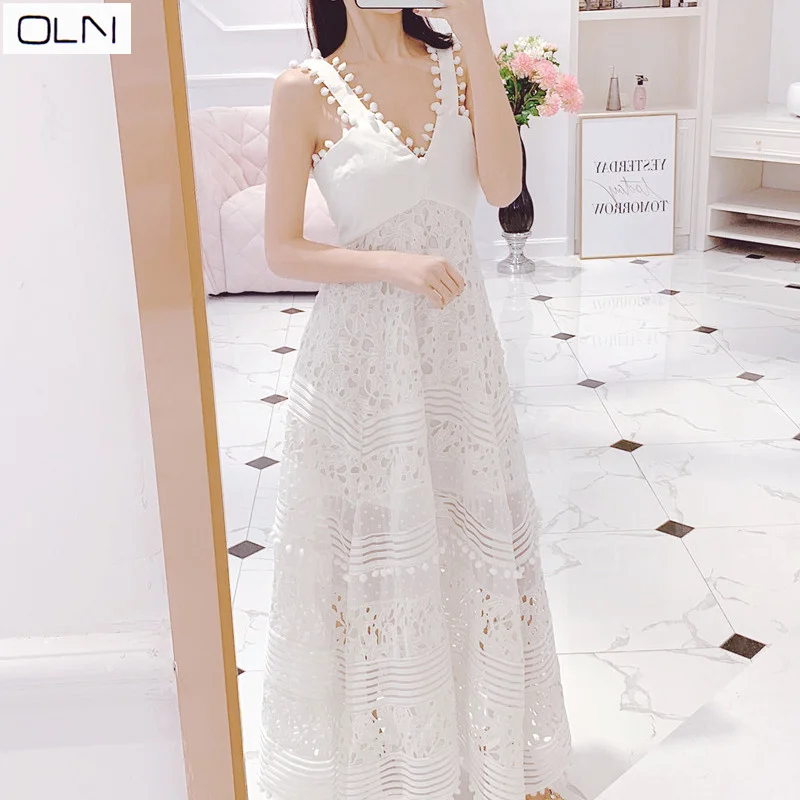 

Australia ZIM vacation style V-neck ladies temperament hollow embroidery stitching lace irregular strap dress dress