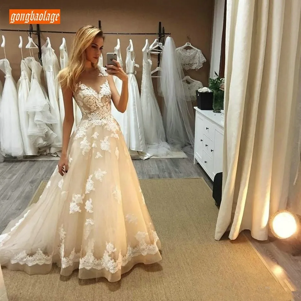 

New Designer Top Quality Lace Appliqued Beige Wedding Dresses Customized 2019 Gorgeous Wedding Gowns Tulle A Line Bridal Dress