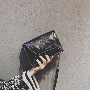 

2019 Fashion new Korean version of the chain irregular stripes summer hand purse bag