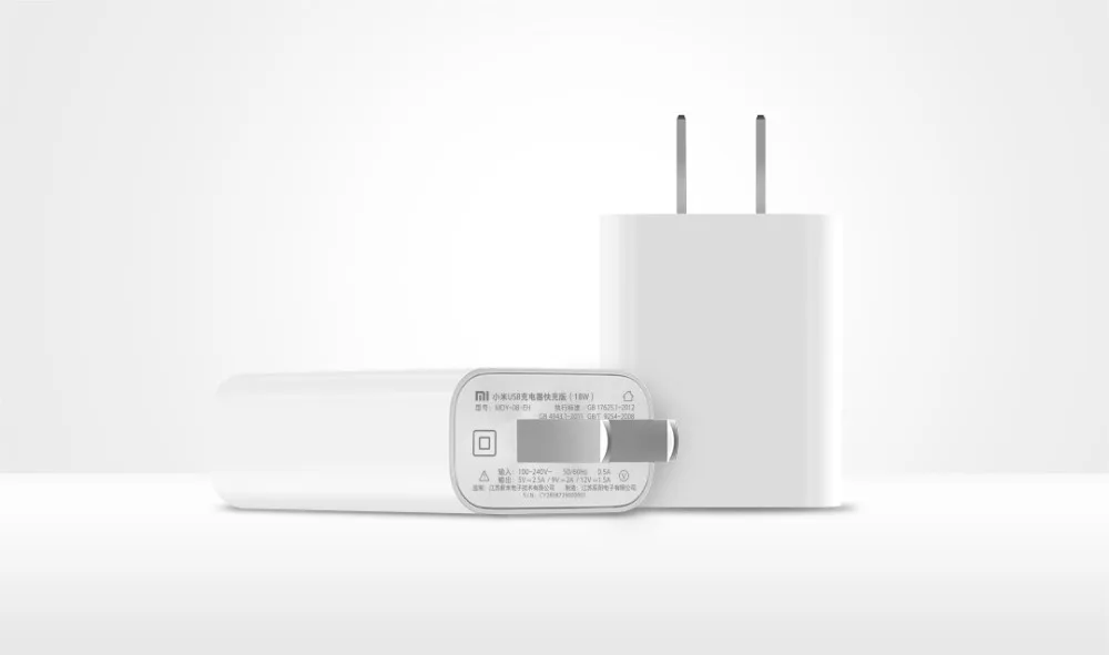 Xiaomi быстрое Зарядное устройство 18W MDY-08-EH Выход 5В = 2.5A 9V = 2A 12V = 1.5A Вход AC100-240V 50/60Hz 0.5A 44,6g 62x39x22 мм