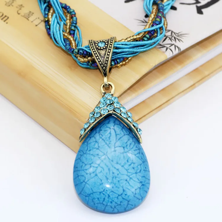 

Bohemian style European and American fashion hemp rope pine stone necklace multi-layer pendant set with crystal