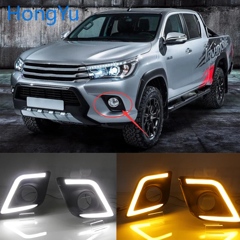 

For Toyota Hilux Revo Vigo 2015 - 2017 Daytime running lights LED DRL Fog lamp driving lights with Yellow Turn Signal Function