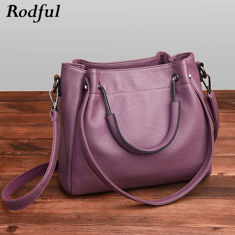 purple leather messenger bag