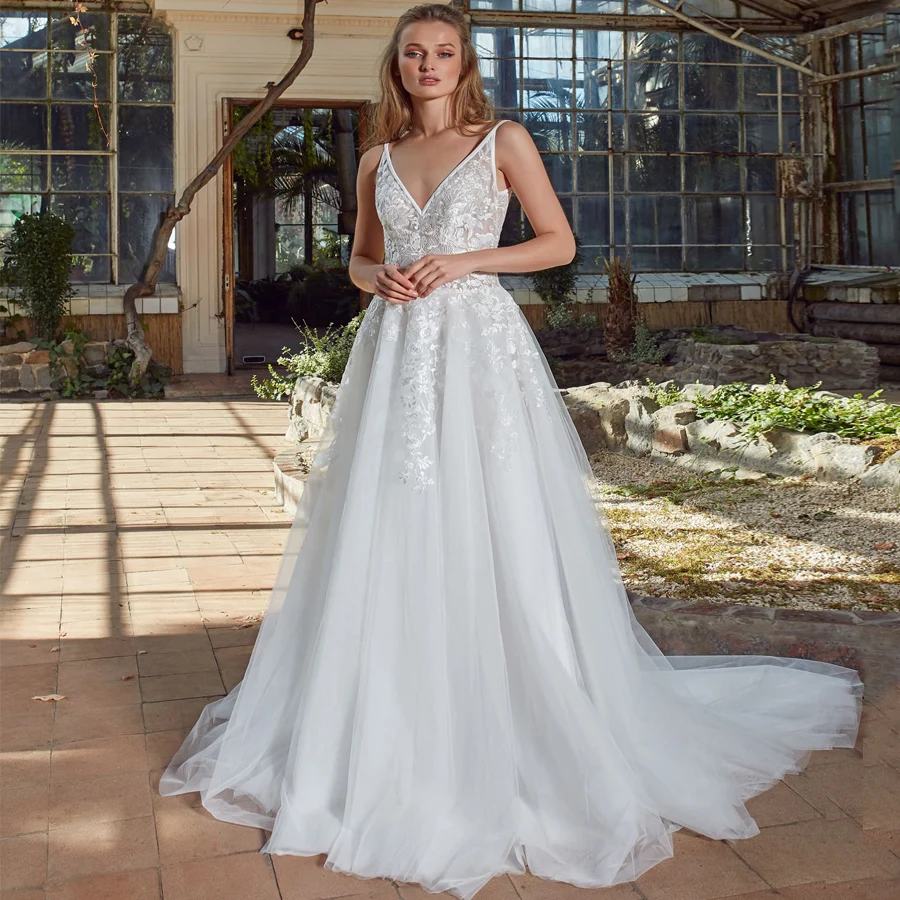

Sexy Deep V-neck Sleeveless Wedding Dresses Robe De Mariage Custom Applique A-line Tulle Wedding Gown Sweep Train