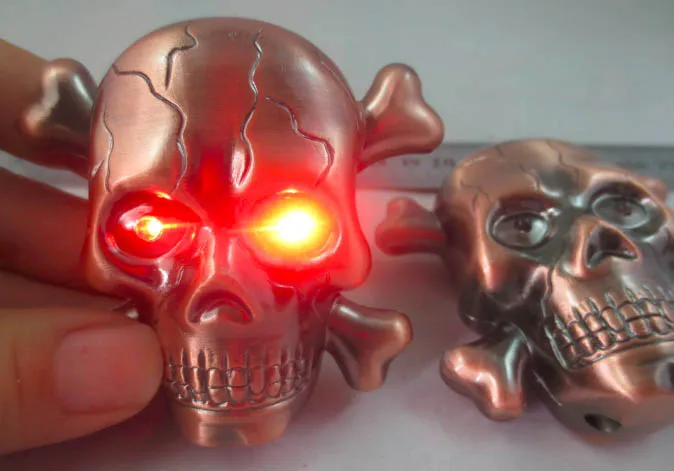 

skull lighter with red flashing eyes