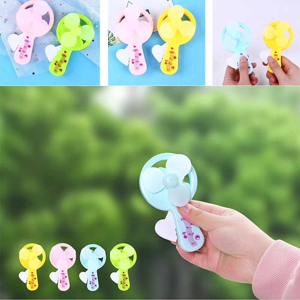 

Exquisite Fun 1pc Mini Cooling Interesting Palm Pressure Mini Fan Candy colors Cute Educational Toys for Children Adult Mini Fan