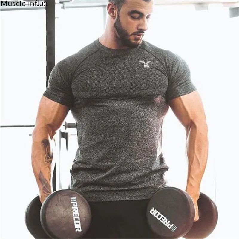

2019 New Men Running Tight Short T-shirt compression Quick dry t shirt Male Gym Fitness Bodybuilding jogging Tees Tops clothing