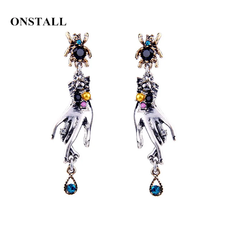 

Manufacturers creative design new earrings exaggerated personality spider small hand pendant earrings women's earrings jewelr