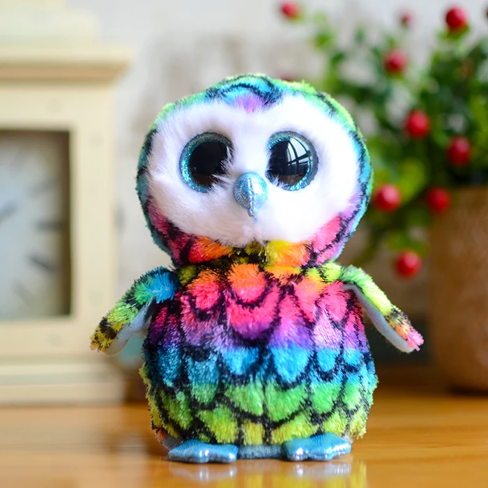 peluche hibou gros yeux
