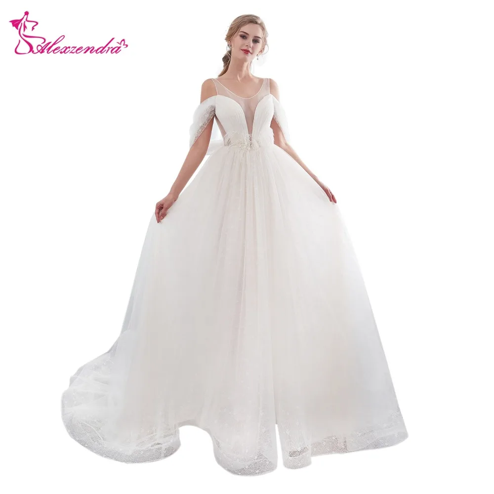 Alexzendra Stock Dress Ivory Tulle Unique Design Sexy Ball