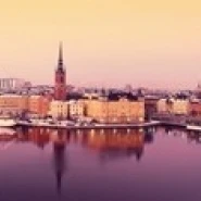 Reflection of buildings in a lake  Lake Malaren  Riddarholmen  Gamla Stan  Stockholm  Sweden Poster Print (18 x 6)