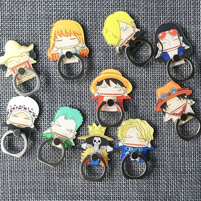 

Cheap price One Piece Luffy nami roronoa zoro Anti-fall Chopper Metal Finger Ring Mobile Phone Support action toy