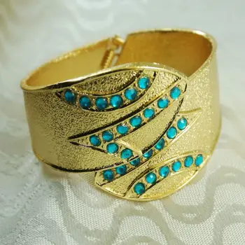 

gold napkin ring with blue crystal, napkin holder for wedding