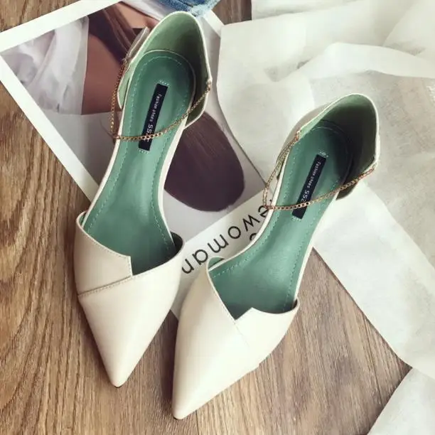 

High heels, female tip, sexy chain, word for word, and the new hollow banquet women's shoes in the spring and summer of 2018.