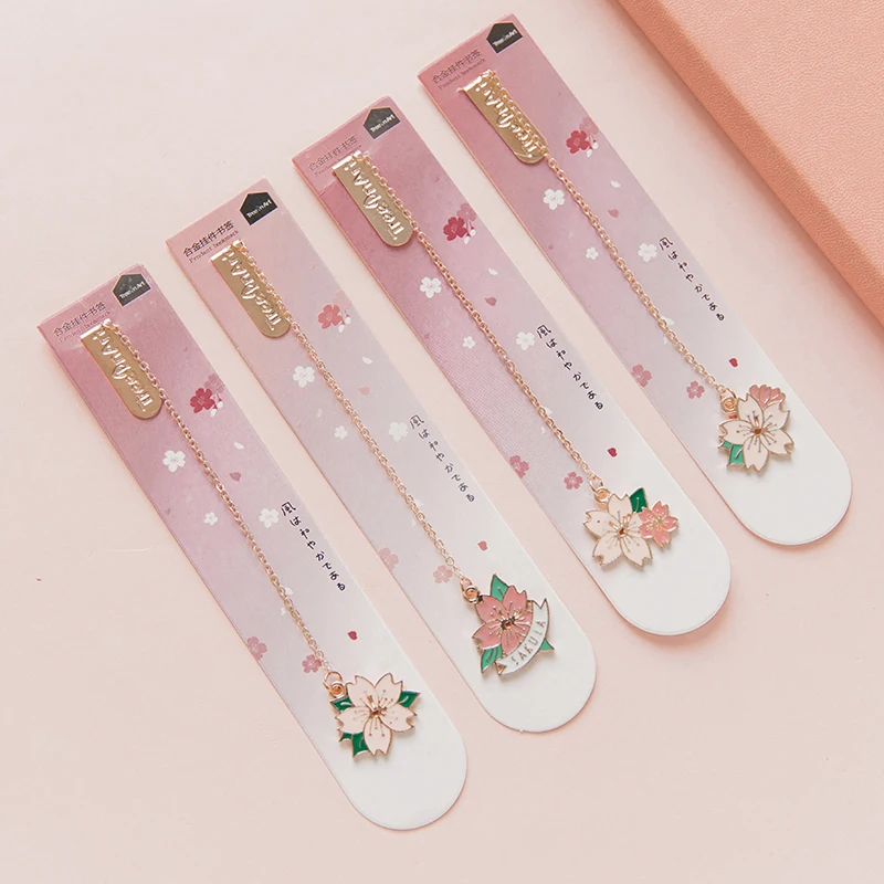 

JIANWU 1pcs japan Cute decoration Sakura Metal pendant bookmark Originality bookmark Student stationery School supplies kawaii
