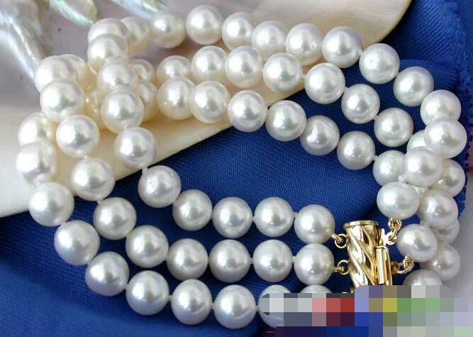 

0885 3ROW ROUND WHITE FRESHWATER CULTURED PEARL BRACELET