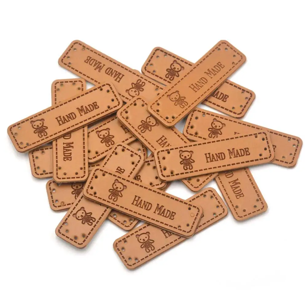 

KALASO Wholesale 30pcs Bears Handmade Labels Clothes Garment PU Leather Labels Hand Made Tags Caps Bags Shoes Sewing Supplies