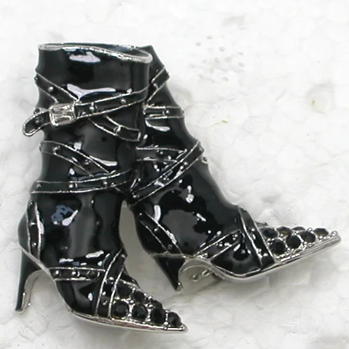 black heels with brooch