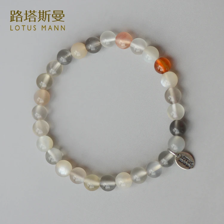 

Bracelet orange gray net through 6 mm moonstone bracelet