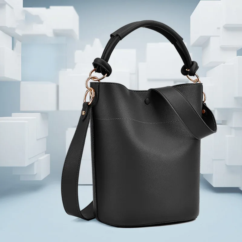 

Europe and the United States wind portable ladies bag 2019 new wide shoulder belt bucket bag retro diagonal shoulder bag