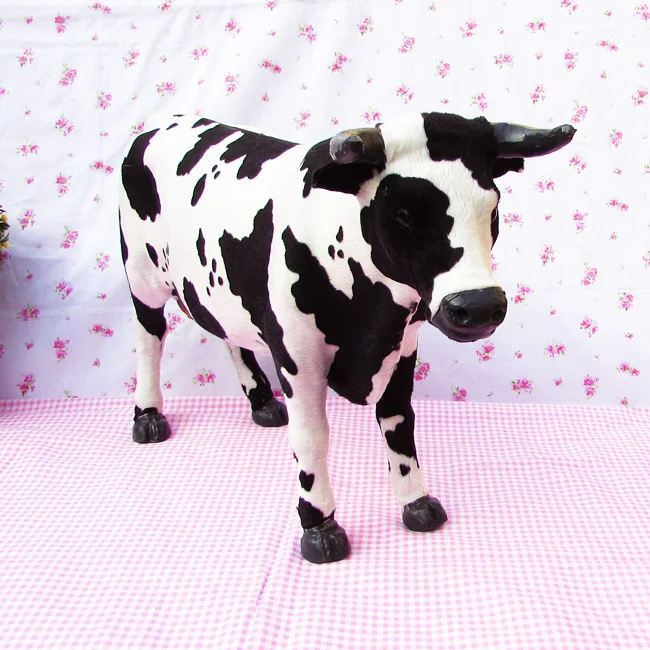

lovely simulation cow toy cute Lifelike&flannelette handicraft cow doll gift about 50x30cm