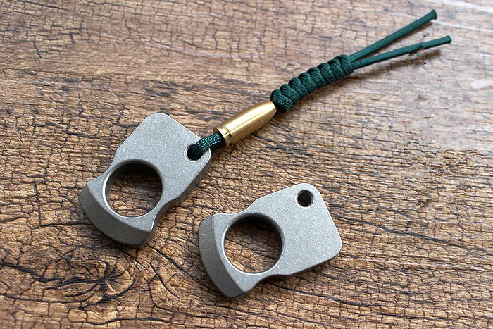 

Christmas Gifts EDC titanium alloy multipurpose Tools meteorite crater style polished or stonewash tiger broken window keychain