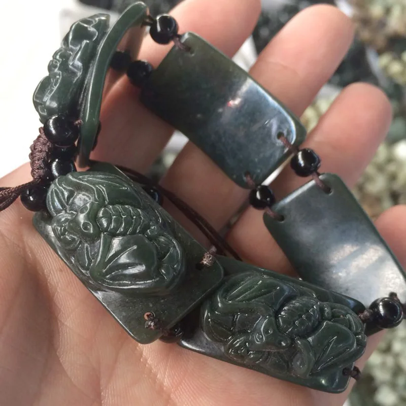 

Hetian jade jade bracelets Moyu Wufu bat hand carving Bracelet