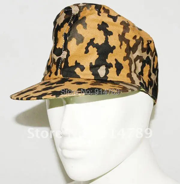 

WWII GERMAN OAK REVERSIBLE CAP SIZE M -31459
