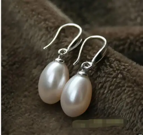 

Selling Baroque pearls 7X9mm oval white pearl teardrop Solid sterling silver earring