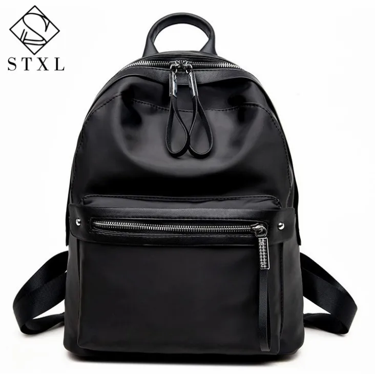 

STXL Shoulder bag 2017 new Korean ladies backpack Oxford wave travel student bag