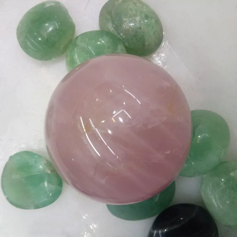 

Diameter 5-6cm Natural rose crystal quartz Ball with base Ornaments Love Guard Flourishing Career Avoid Evil Spirits