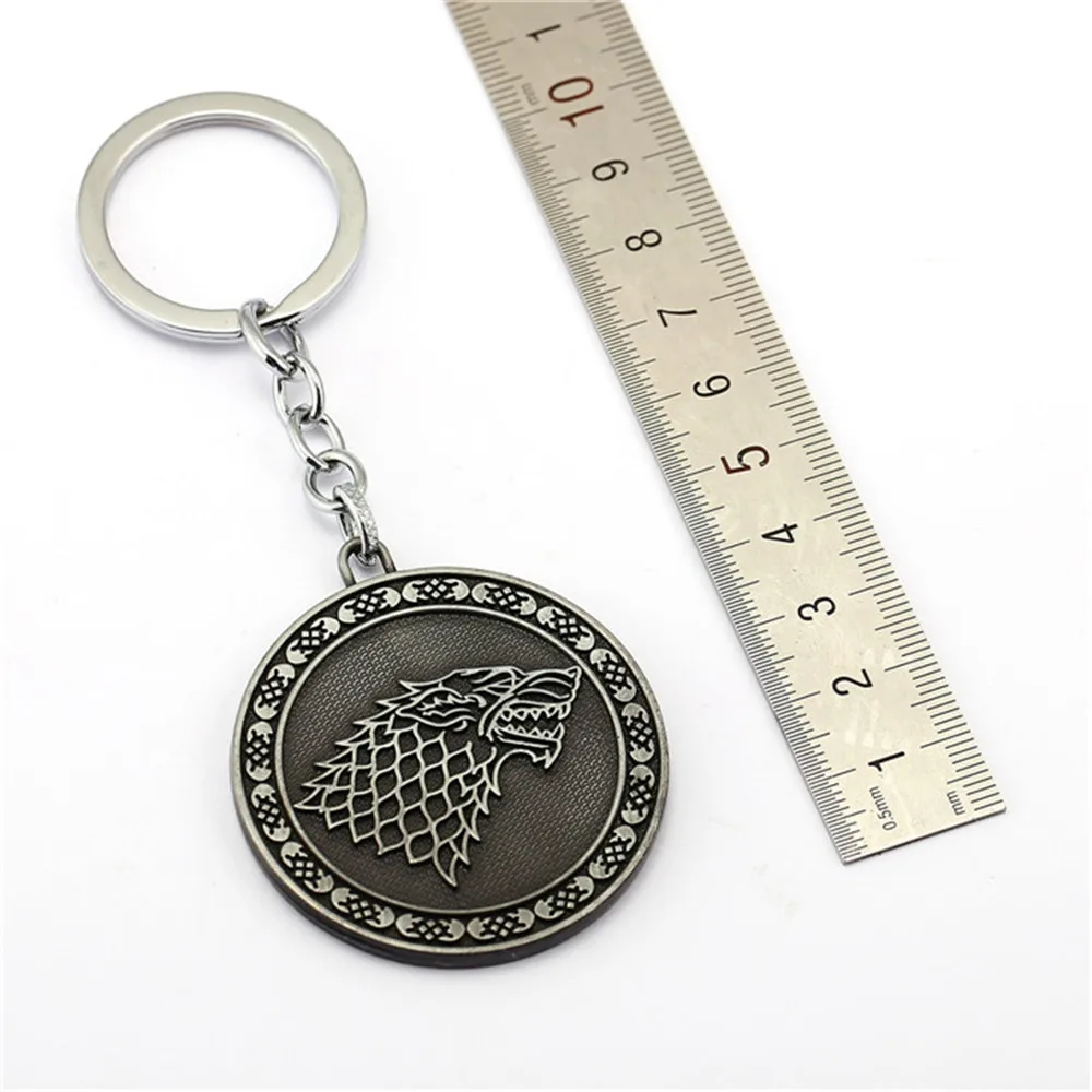 

House Greyjoy Baratheon Targaryen Lannister Stark Keychain Wolf Head Coin Key Chain Ring Metal Men Car Jewelry Chaveiro Llaveros