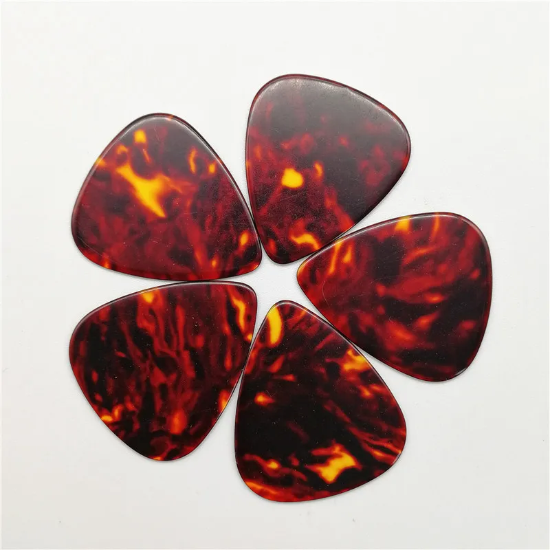 

Free Shipping 100PCS Tortoise Shell Color Celluloid Guitar Picks Different Thickness Guitar Plectrum