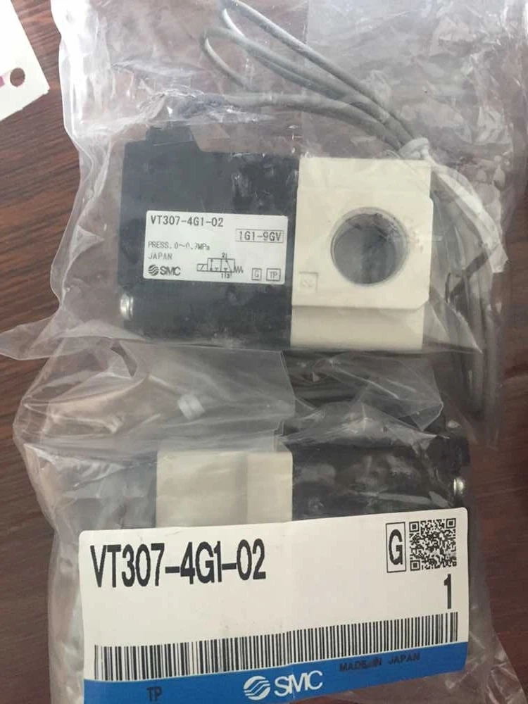 

New original solenoid valve VT307-4G1-02 AC220V Rc1/4