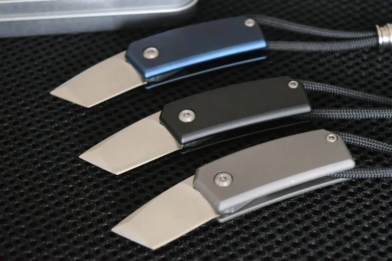 TRSKT Mini Folding Knife Pocket Utility Hunting Camping Survival Knives Multi Tools Titanium alloy Handle Built-in Opener EDC |