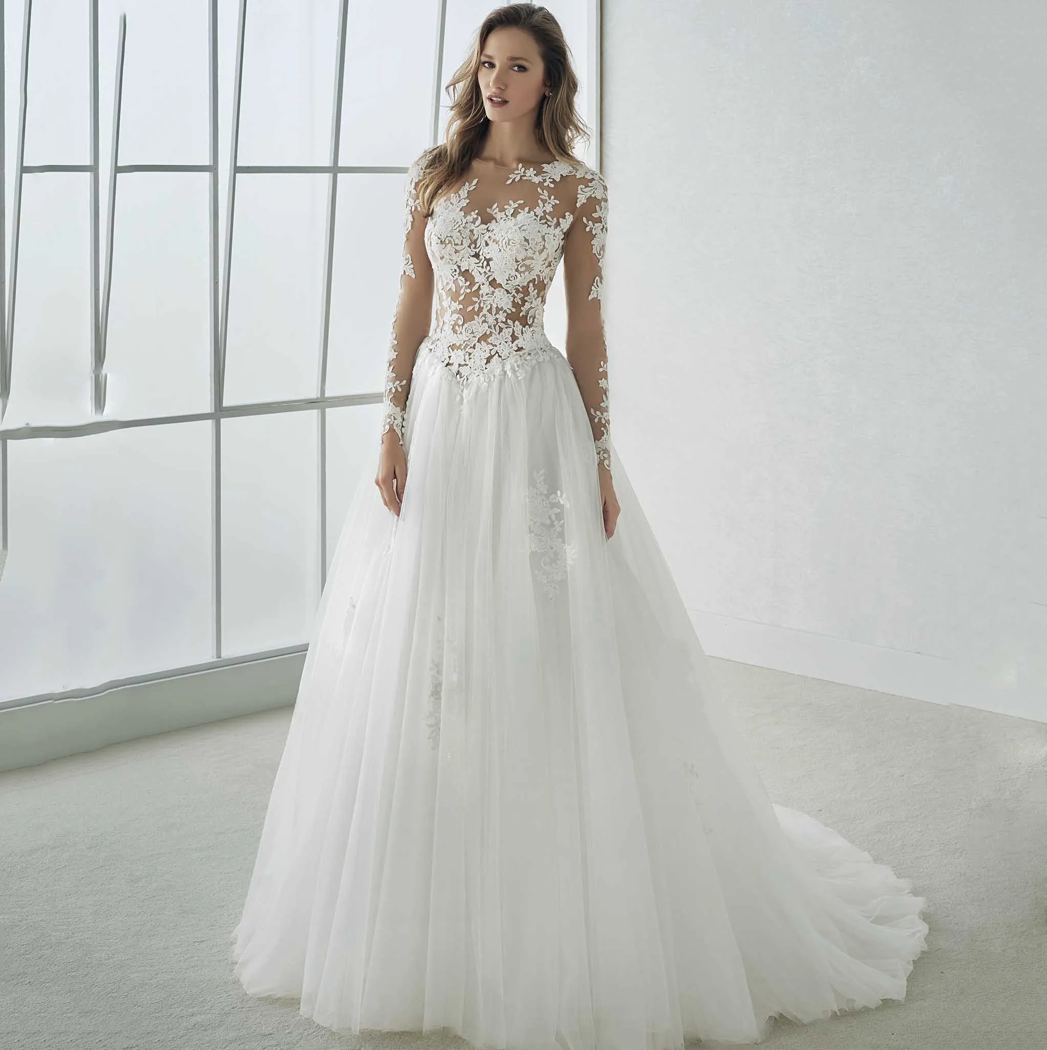 

Illusion Long Sleeve Lace Appliques Sexy Wedding Dress Tulle Skirt Cheap A line Bridal Gown Court Train 2019