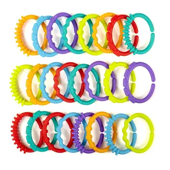 

2019 New Rainbow Baby Tooth Aprons Clutch Ring Connecting Ring Birthday Gift Toys For Children Hot Selling