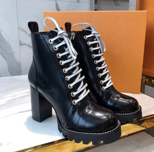 

Chic women 9cm thick heels ankle boots real leather martin boots high heels short boots Fashion Motorcycle biker boots BY574