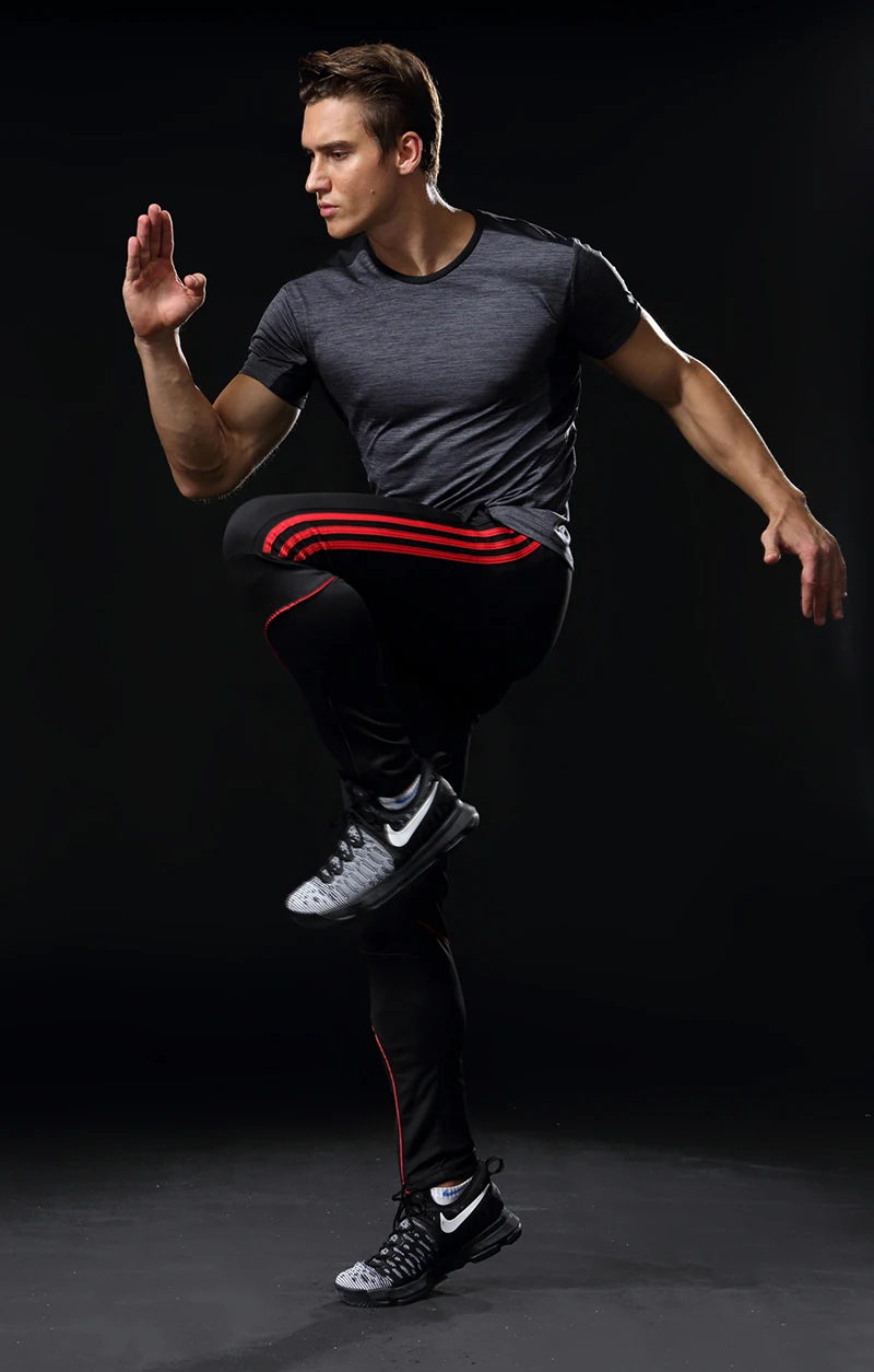 Tanie Sportowe spodnie do biegania męskie z kieszeniami Athletic Football trening piłkarski spodnie elastyczność Legging jogging spodnie gimnastyczne 319