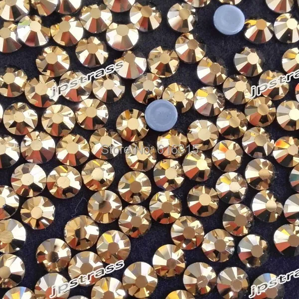 

Free shippping !!! high levels shiny of gold color ss30 with 288 pcs each pack ;golden crystal for children dancing wear