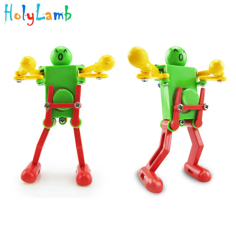 1Pcs Random Color Novelty Dancing Robot Gift Kids Children Baby Clockwork Classic Educational Toys Develop Intelligence Gift 1Pcs Random Color Novelty Dancing Robot Gift Kids Children Baby Clockwork Classic Educational Toys Develop Intelligence Gift