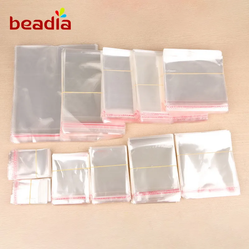 

200PCS Pick Size Transparent Clear Plastic OPP Self-adhesive Seal Storage Bags Jewelry Packaging Party Favor Gift Bags Pouches