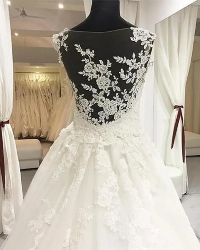fresh-illusion-bodice-wedding-dresses-elegant-sheer-lace-appliques-neckline-court-train-princess-backless-mopping-long-section-wedding%C2%A0gowns (4)