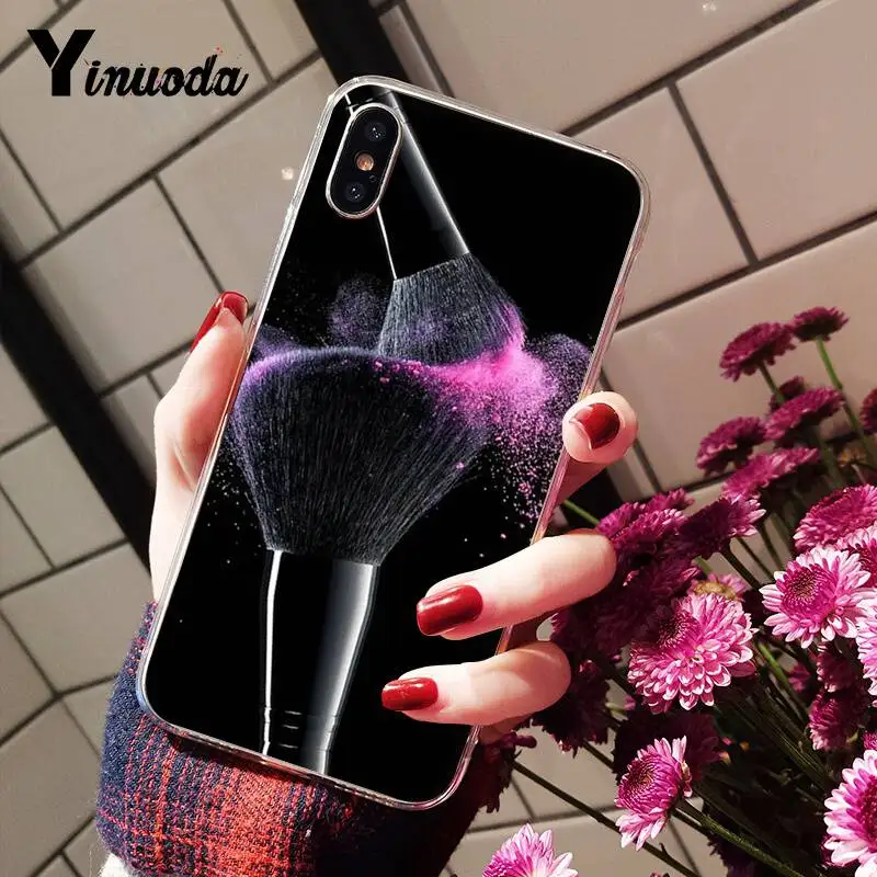 Beautiful girl's makeup brush painting