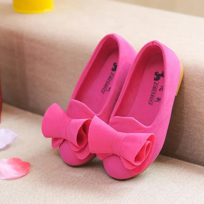 flat shoes with a bow