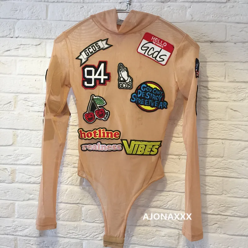 

GCDS Street Sexy Badge Mock Neck Women Transparent Gauze Primer Long Sleeve Bodysuit Perspective Mesh Hotline Chop Romper Female