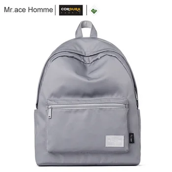 

New backpack men's computer backpack casual women's bag tide models solid color wild student bag