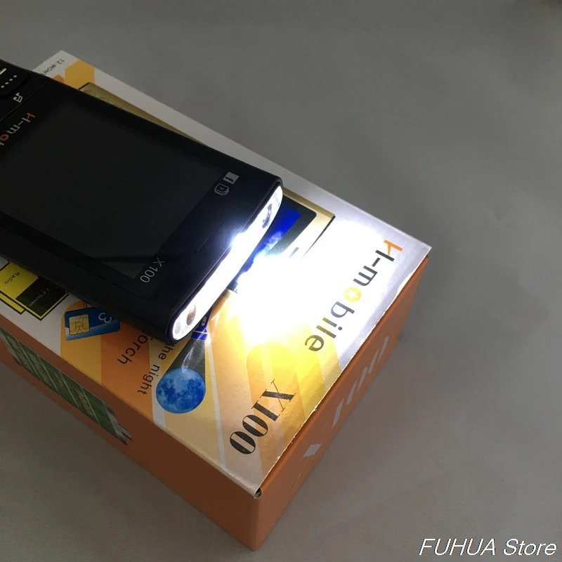 H Mobile X100 три sim карты режима ожидания большой фонарь динамик Вибрация радио 3800 мАч