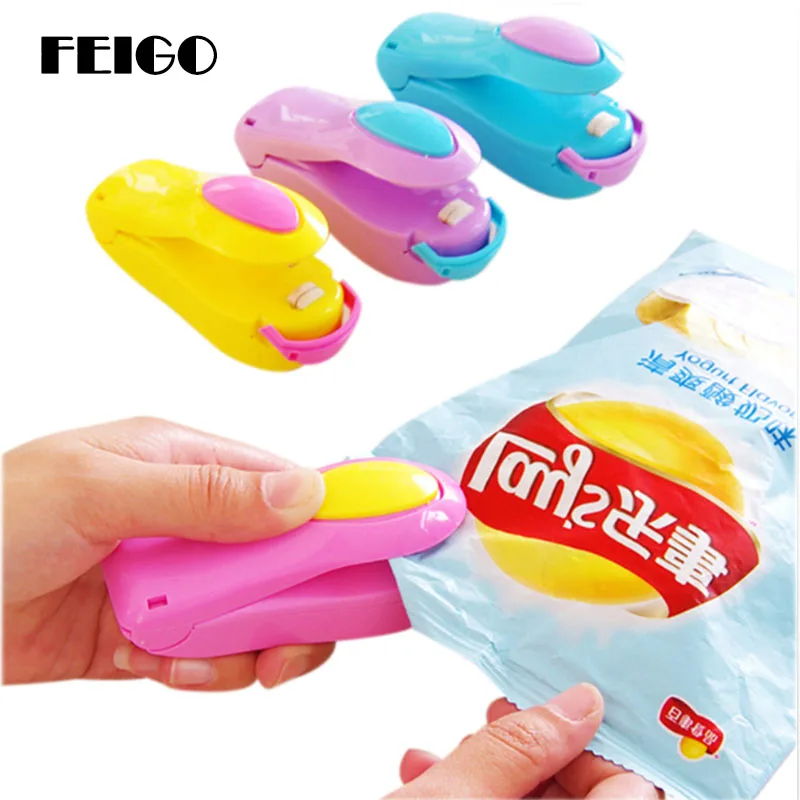 

FEIGO Portable Mini Handheld Holder Household Electric Sealing Machine Machine Sealed Packaging Plastic Bag Sealed Food Bag F274