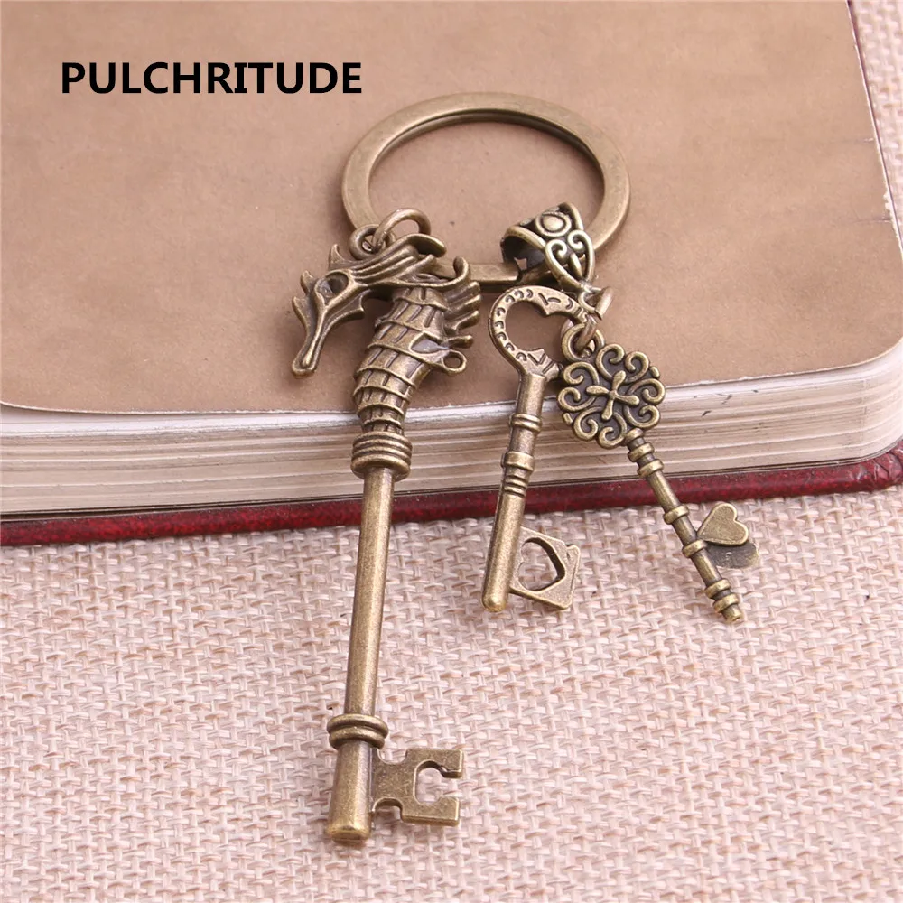

PULCHRITUDE 2 pcs/lot Metal Antique Bronze Key Letter Charm Key Ring DIY Metal Amimal Seamaster Key Pendant Jewelry Making C0239